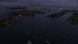 6.7K aerial stock footage of approaching the Venetian Island at twilight, Miami, Florida Aerial Stock Footage | AX0172_215