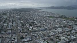 6K aerial stock footage of approaching the Marina District neighborhood and Golden Gate Bridge in San Francisco, California Aerial Stock Footage | AX0173_0049