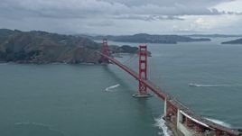 6K aerial stock footage flying through fog to reveal the Golden Gate Bridge in San Francisco, California Aerial Stock Footage | AX0173_0052
