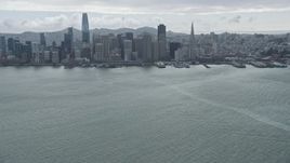 6K aerial stock footage of the city's downtown skyline seen from the bay, San Francisco, California Aerial Stock Footage | AX0173_0073