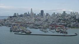 6K aerial stock footage of the San Francisco skyline seen from Fisherman's Wharf, California Aerial Stock Footage | AX0173_0103