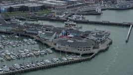 6K aerial stock footage of flying past the famous Pier 39 in San Francisco, California Aerial Stock Footage | AX0173_0106