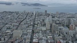 6K aerial stock footage flying by Nob Hill apartment buildings in San Francisco, California, with view of Alcatraz Aerial Stock Footage | AX0173_0124