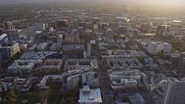 6K aerial stock footage of flying over Downtown San Jose office and apartment buildings at sunset, California Aerial Stock Footage | AX0174_0031