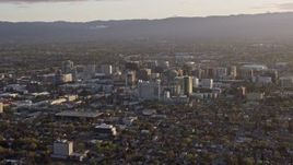 6K aerial stock footage of a view of city buildings in Downtown San Jose at sunset, California Aerial Stock Footage | AX0174_0040