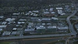 6K aerial stock footage of Facebook office buildings at sunset, Menlo Park, California Aerial Stock Footage | AX0174_0054