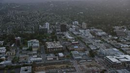 6K aerial stock footage of flying by San Mateo office and apartment buildings at sunset, California Aerial Stock Footage | AX0174_0062
