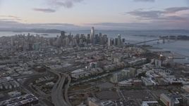 6K aerial stock footage approach the San Francisco skyline from South of Market at sunset, California Aerial Stock Footage | AX0174_0079