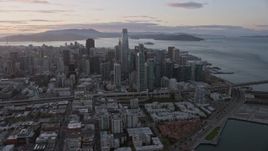 6K aerial stock footage of flying by the San Francisco skyline at sunset, California Aerial Stock Footage | AX0174_0081