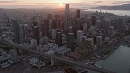 6K aerial stock footage of flying by Downtown San Francisco at sunset, California Aerial Stock Footage | AX0174_0082
