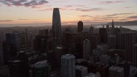 6K aerial stock footage of flying over Downtown San Francisco toward the setting sun, California Aerial Stock Footage | AX0174_0092