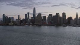 6K aerial stock footage of approaching the Downtown San Francisco skyline at twilight, California Aerial Stock Footage | AX0174_0099