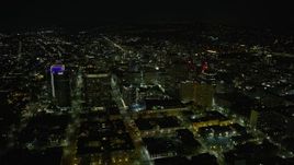 6K aerial stock footage of flying by office buildings in Downtown Oakland at night, California Aerial Stock Footage | AX0174_0130
