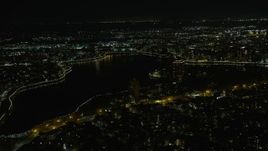6K aerial stock footage of Lake Merritt near Downtown Oakland at night, California Aerial Stock Footage | AX0174_0133