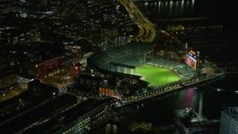 6K aerial stock footage of circling Oracle Park stadium at night, San Francisco, California Aerial Stock Footage | AX0174_0142
