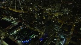 6K aerial stock footage fly away from Downtown San Francisco skyscrapers at night, California Aerial Stock Footage | AX0174_0160