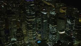 6K aerial stock footage of orbiting skyscrapers in Downtown San Francisco at night, California Aerial Stock Footage | AX0174_0167