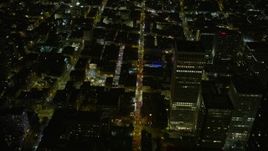 6K aerial stock footage tilt to bird's eye view of Grant Ave in Chinatown at night, San Francisco, California Aerial Stock Footage | AX0174_0187