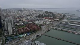6K aerial stock footage flyby Downtown San Francisco and Coit Tower on a foggy day, California Aerial Stock Footage | AX0175_0022