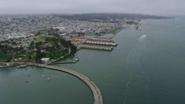 6K aerial stock footage fly over Aquatic Park and Fort Mason to approach Marina District, San Francisco, California Aerial Stock Footage | AX0175_0025