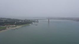 6K aerial stock footage pan from the Presidio to reveal the Golden Gate Bridge, San Francisco, California Aerial Stock Footage | AX0175_0027