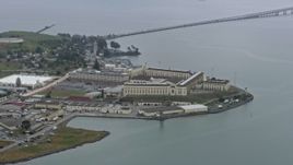 6K aerial stock footage of San Quentin State Prison on a foggy day, California Aerial Stock Footage | AX0175_0042