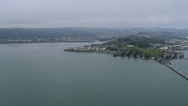 6K aerial stock footage of flying toward toward San Quentin Prison from the Richmond Bridge, California Aerial Stock Footage | AX0175_0055