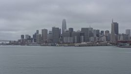 6K aerial stock footage a low altitude view of the Downtown San Francisco skyline on a foggy day, California Aerial Stock Footage | AX0175_0072