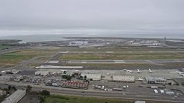 6K aerial stock footage of approaching runways at Oakland Airport, California Aerial Stock Footage | AX0175_0091