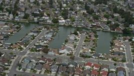 6K aerial stock footage of waterfront homes by canals in Alameda, California Aerial Stock Footage | AX0175_0098