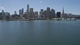 6K aerial stock footage ascend over Ferry Building and Downtown San Francisco, California Aerial Stock Footage | AX0175_0116
