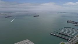 6K aerial stock footage approach cargo ships sailing San Francisco Bay, California Aerial Stock Footage | AX0175_0145