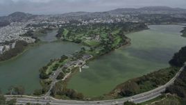 6K aerial stock footage of a golf course and Lake Merced in Lakeshore, San Francisco, California Aerial Stock Footage | AX0175_0188