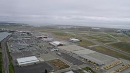 6K aerial stock footage of flying past runways at Oakland Airport, California Aerial Stock Footage | AX0175_0221