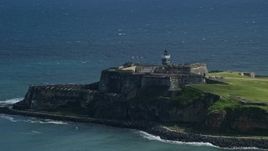 4.8K aerial stock footage of a Historic fort along the coast in the blue waters of the Caribbean, Old San Juan Puerto Rico Aerial Stock Footage | AX101_018E