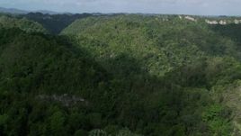 4.8K aerial stock footage Panning mountains and jungle, Karst Forest, Puerto Rico Aerial Stock Footage | AX101_053