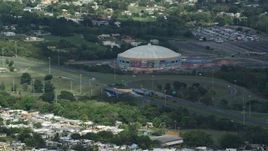 4.8K aerial stock footage of the Coliseo Manuel Iguina sporting arena, Arecibo Puerto Rico Aerial Stock Footage | AX101_132E