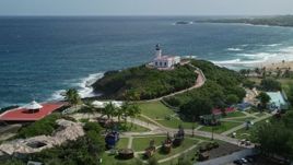 4.8K aerial stock footage approaching Arecibo Lighthouse along the harbor and the blue Caribbean waters, Puerto Rico Aerial Stock Footage | AX101_141E