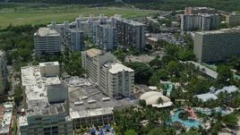 4.8K aerial stock footage of El San Juan Resort and Casino and apartment buildings, Carolina, Puerto Rico  Aerial Stock Footage | AX102_010
