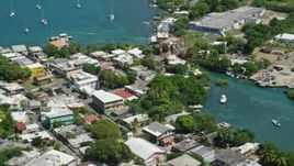 4.8K aerial stock footage of a small coastal town by sapphire blue water, Culebra, Puerto Rico Aerial Stock Footage | AX102_145E