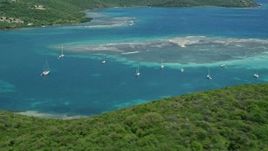 4.8K aerial stock footage of Sailboats near a reef in sapphire blue waters, Culebra, Puerto Rico  Aerial Stock Footage | AX102_159