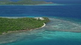 4.8K aerial stock footage of an Oceanfront home along a reef, Culebra, Puerto Rico  Aerial Stock Footage | AX102_173