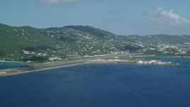 4.8K aerial stock footage Approaching Cyril E King Airport and coastal homes, St. Thomas  Aerial Stock Footage | AX102_195