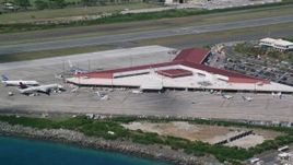 4.8K aerial stock footage of the Main terminal at Cyril E King Airport, St. Thomas  Aerial Stock Footage | AX102_197