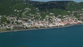 4.8K aerial stock footage of a coastal town on a hillside along sapphire waters, Charlotte Amalie, St. Thomas Aerial Stock Footage | AX102_207E