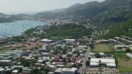 4.8K aerial stock footage Looking out on a coastal town from the hills, Charlotte Amalie, St. Thomas  Aerial Stock Footage | AX102_213