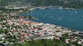 4.8K aerial stock footage of a coastal town and sapphire waters with sailboats, Charlotte Amalie, St Thomas Aerial Stock Footage | AX102_219E