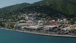 4.8K aerial stock footage of a coastal town between the hills and blue waters, Charlotte Amalie, St Thomas Aerial Stock Footage | AX102_225E
