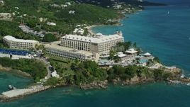 4.8K aerial stock footage of Marriott's Frenchman's Cove on sapphire blue waters,  St Thomas Aerial Stock Footage | AX102_231E