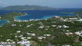 4.8K aerial stock footage of The Ritz-Carlton resort along turquoise waters, St Thomas Aerial Stock Footage | AX102_242